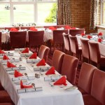 banquet seating with bright accent napkins
